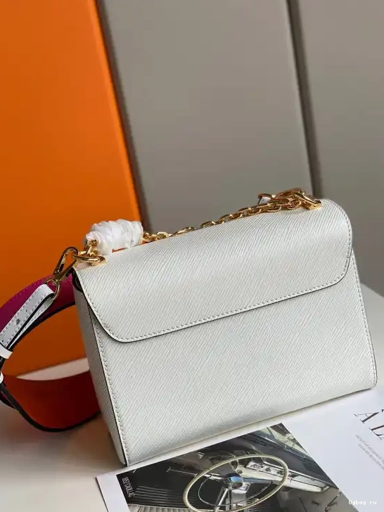 VUITTON TWIST LOUIS MM 0503